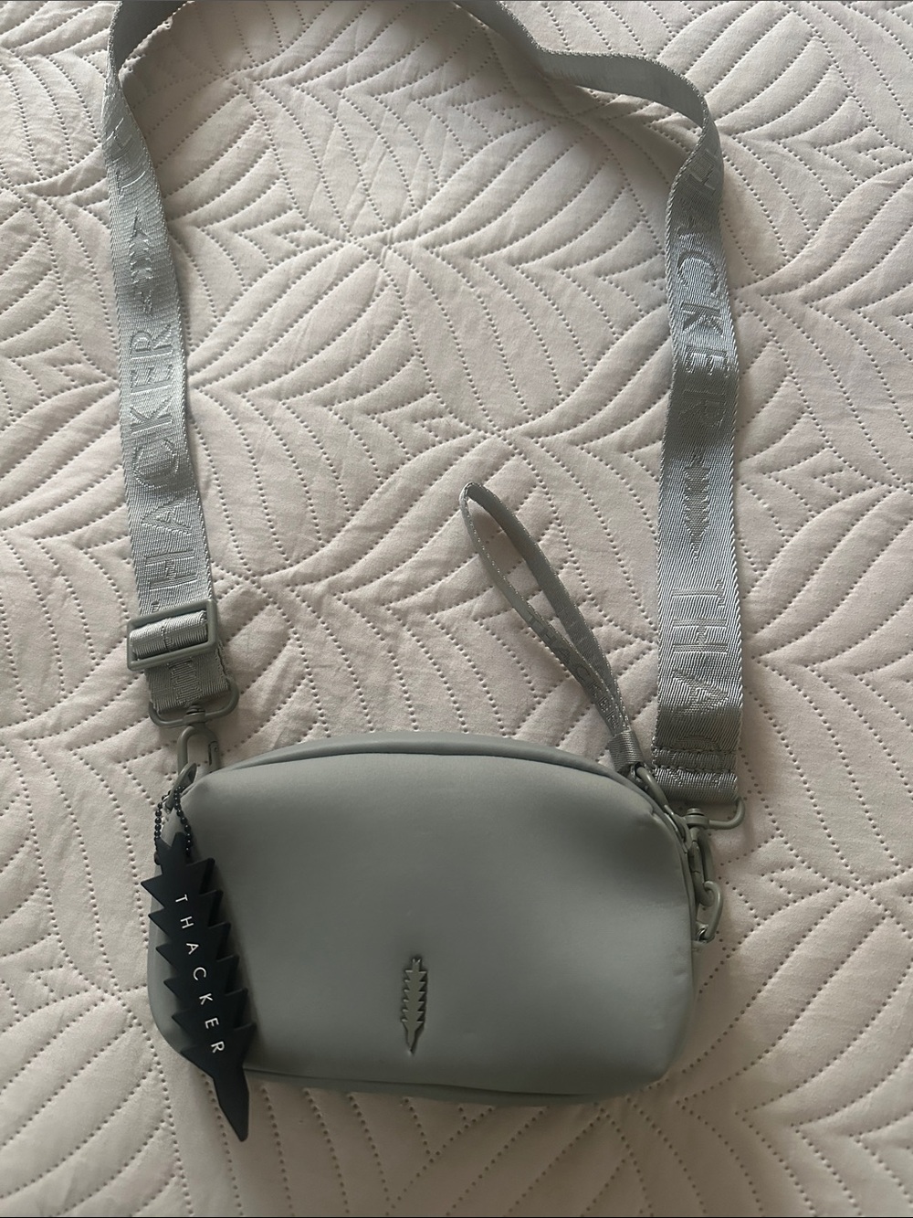 Thacker Smooth Light Gray Crossbody Bag with Logo Strap